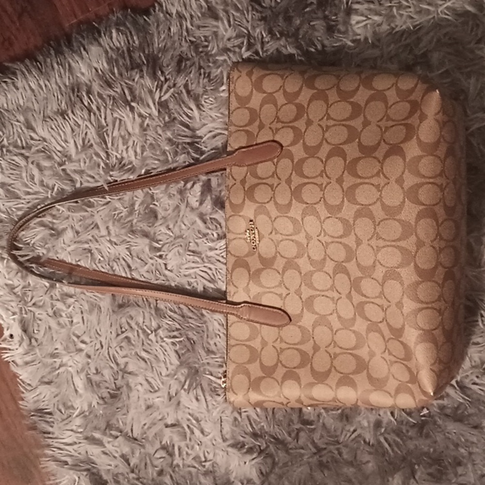 Coach zip top tote. With matching wallet.